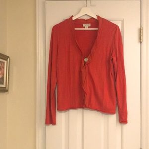 Orange red cardigan with frilly details. Small.